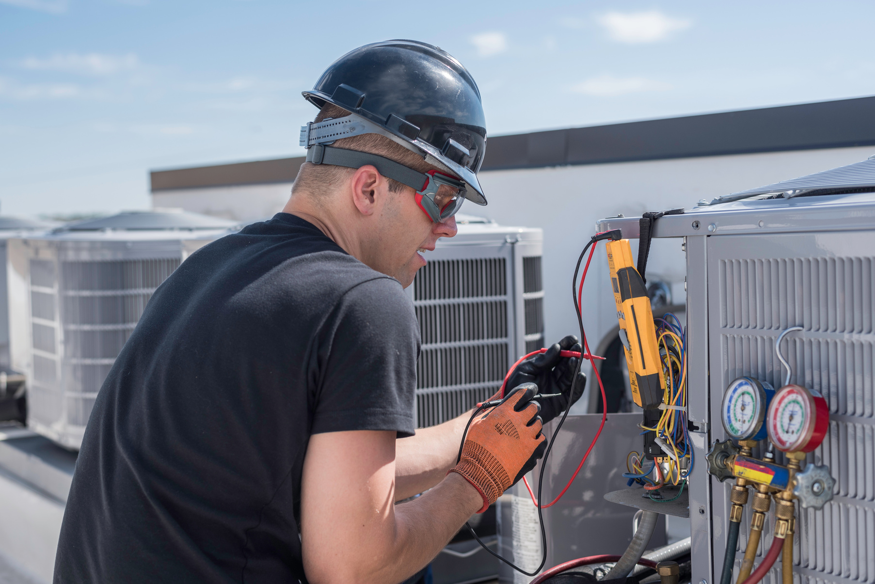 Hvac Worker Checking a Air Conditioner